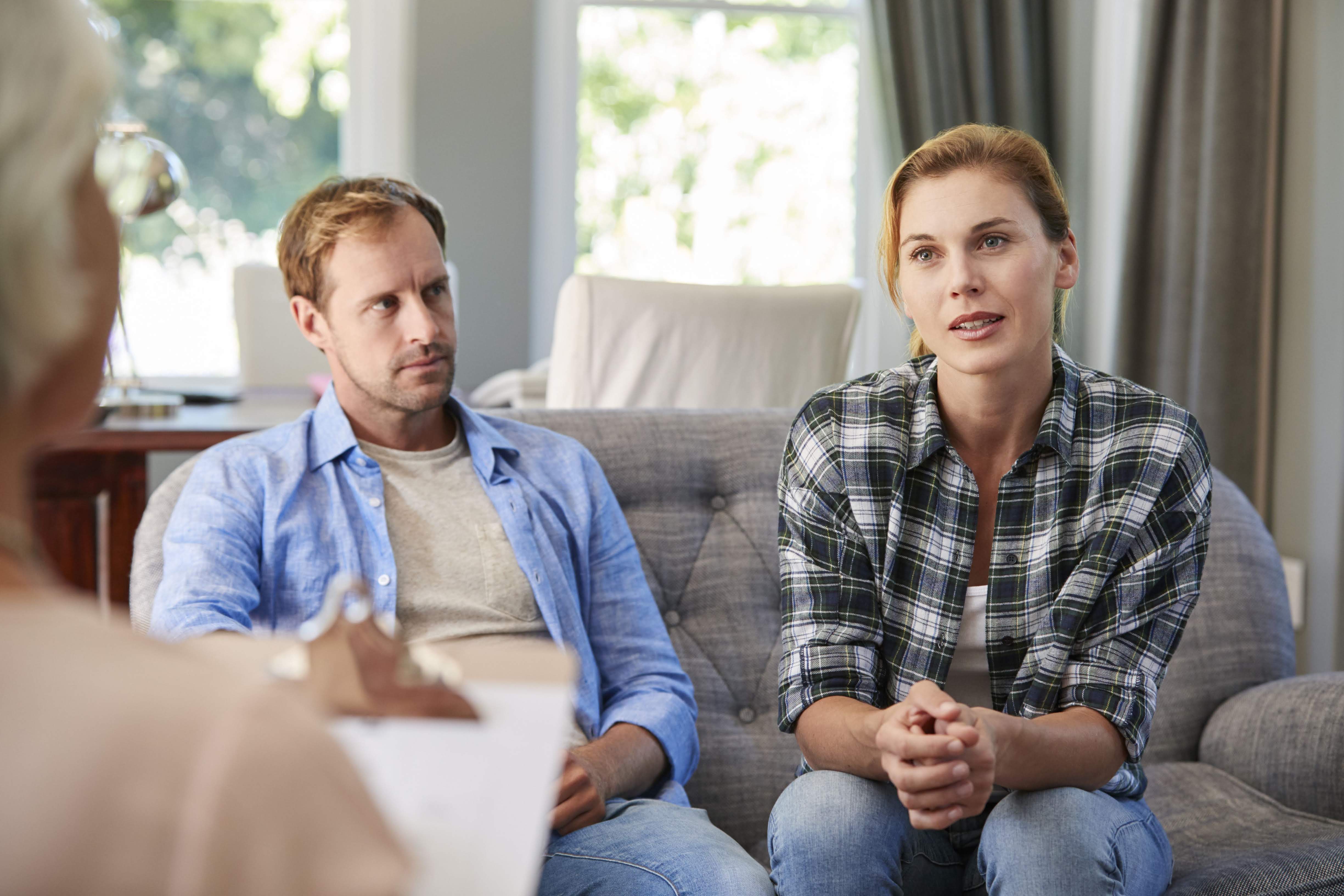 young-couple-having-marriage-counselling-HC9UV3W